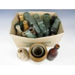 A quantity of glass bottles including Carlisle State Management together with stoneware bottles etc