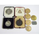 Vintage prize medallions and tokens, including a Royal Life Saving Society bronze medal awarded to