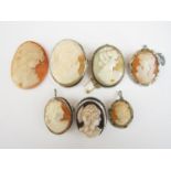 Vintage continental carved shell and other cameo brooches, set in base and white metal