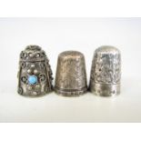 Two silver thimbles together with one other stamped '925'