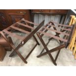 A pair of mahogany luggage stands