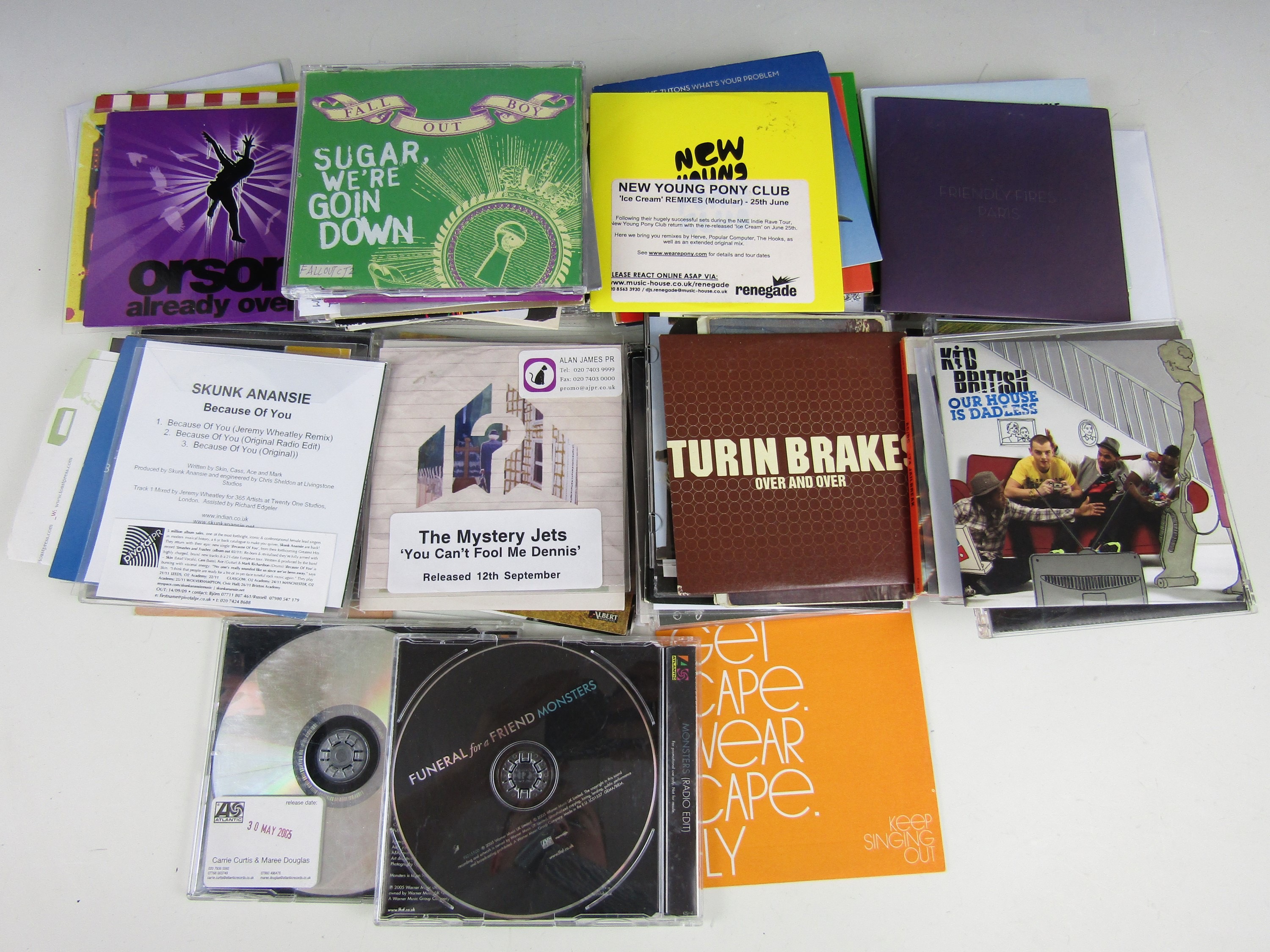 A quantity of promotional Pop music CDs