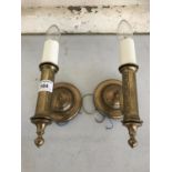 A pair of reproduction brass wall lights / sconces