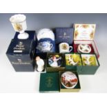 A quantity of boxed ceramics including a Royal Doulton Darling figurine, Royal Worcester cups and