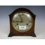 A mid-20th Century Smiths oak mantel clock