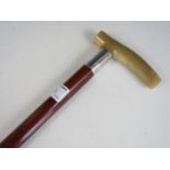 A horn handled and silver collared walking cane