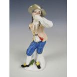 A 19th Century figurine of a gentleman / sailor (a/f)