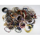 A large quantity of vintage costume jewellery bracelets