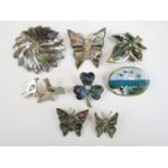 Mexican white metal and 'Alpaca silver' brooches set with abalone, including three in the form of
