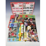 A quantity of Panini football sticker albums