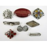 19th Century and later white metal brooches, including two inset with butterfly wing, and one in the