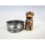 A silver napkin ring together with a small carved cat-form balm pot