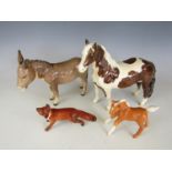 A Beswick donkey together with a horse, a pony and foal, and a Beswick fox