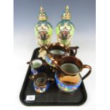 Four Victorian lustre jugs together with a pair of decorative vases (one lid a/f)