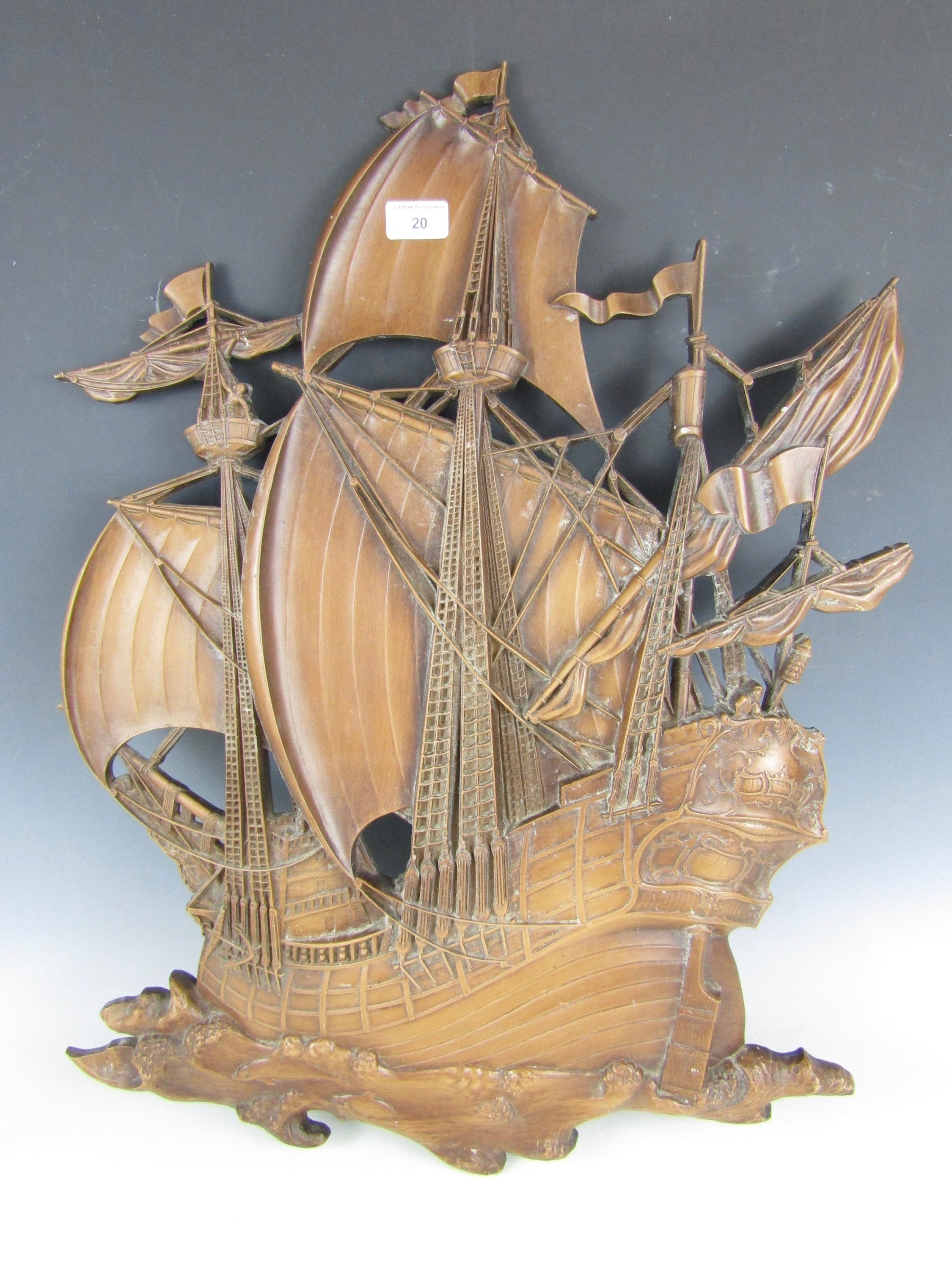 A vintage moulded resin wall plaque modelled as a galleon, 73 cm