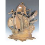 A vintage moulded resin wall plaque modelled as a galleon, 73 cm