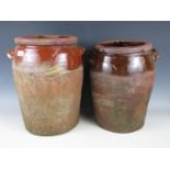 Two antique earthenware crocks, 42 cm and 40 cm