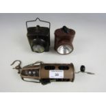 An RAF / Air Ministry inspection lamp and two vintage torches