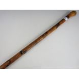 A Meiji Japanese carved bamboo walking cane