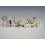 Four vintage porcelain pin ladies etc