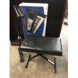 A boxed Yamaha WD54600 electronic keyboard, together with folding stand and stool