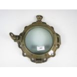 A vintage brass ship's porthole