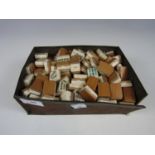 A quantity of bone and bamboo Mahjong pieces / counters