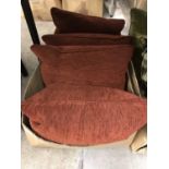 Four down filled scatter cushions with burnt orange chenille covers