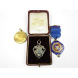 A silver watch chain fob medallion, an enamelled silver-gilt National and Local Government Officers'