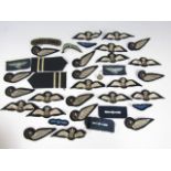 A quantity a reproduction Royal Flying Corps / RAF pilots' wings and aircrew brevets, with sundry