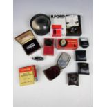 A quantity of vintage camera accessories including an Elgeet Cine Tel 38 mm F.3.5 lens, boxed, a