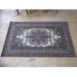 A Woodward and Grosvenor worsted wool rug, 229 x 137 cm