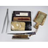 Sundry collectors' items including a Parker pencil, a letter opener, a magnifying lens and a novelty