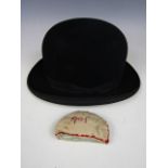 A gentleman's vintage bowler hat, together with an Edwardian handmade egg cosy, with embroidered