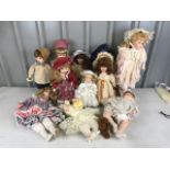 A quantity of porcelain collectors' dolls