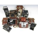 A quantity of vintage cameras including a Kodak vest pocket, a Zeiss Ikonta 20 /18 folding camera, a