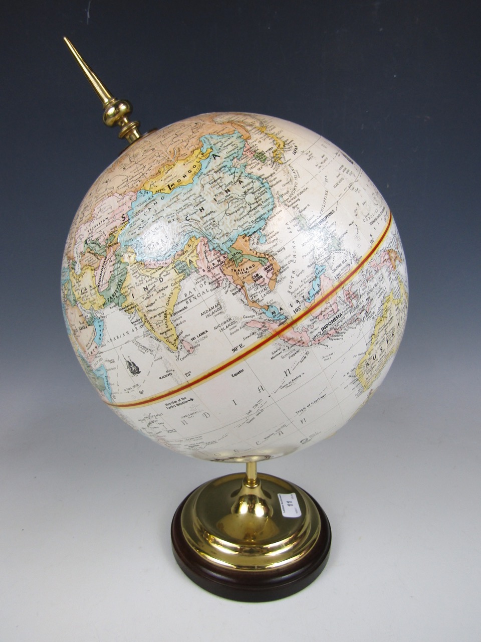 A contemporary brass globe