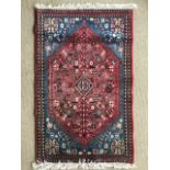 An oriental rug in rose pink and blue, 100 x 64 cm (5)