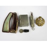 Sundry collectors' items including an RAF cap badge, Vesta case, fob chatelaine necessaire, and