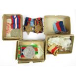 Three sets of Second World War campaign medals in issue cartons