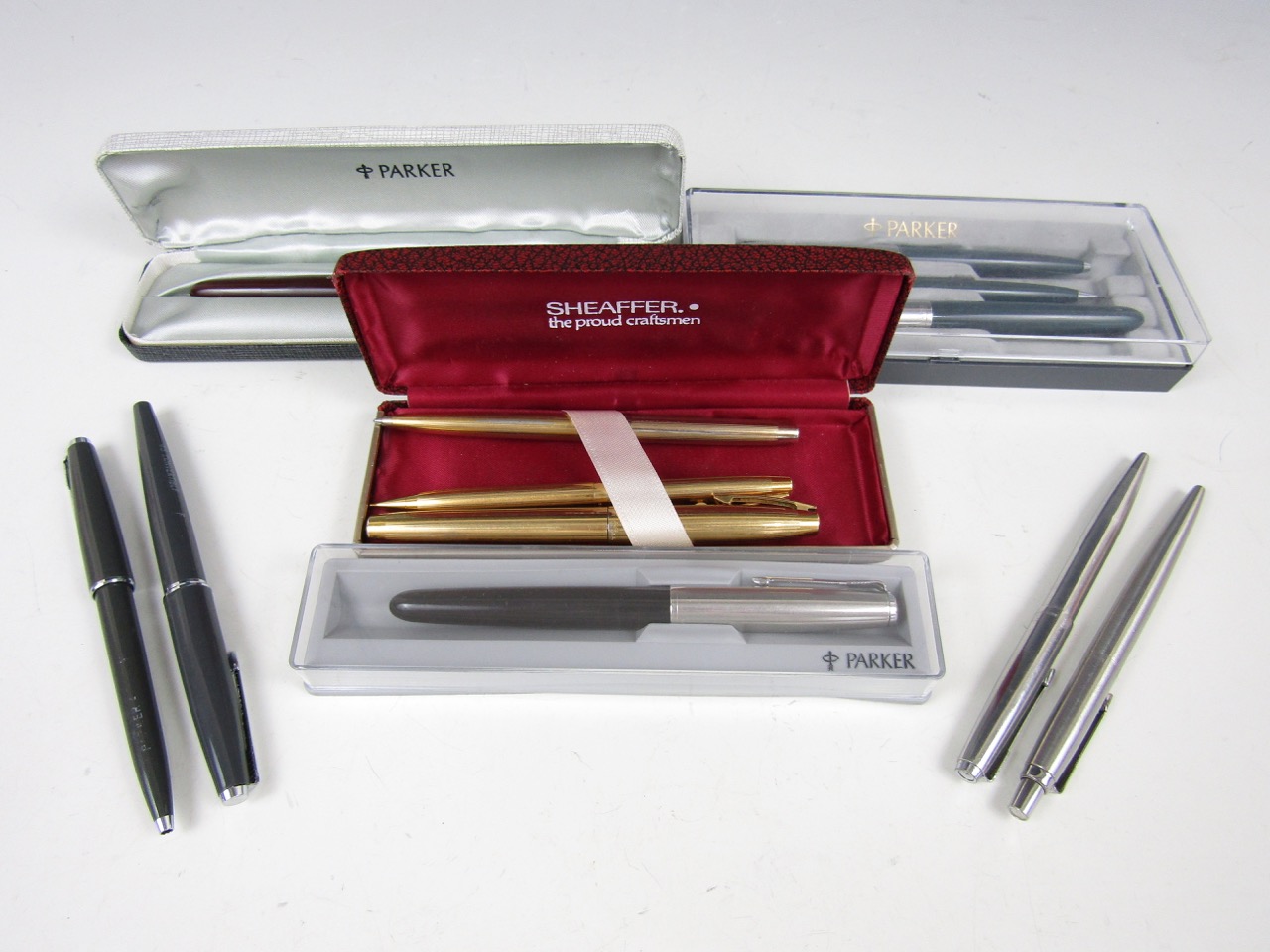 A Parker pen set and other Parker pens