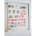 A vintage Stanley Gibbons Swiftsure stamp album containing sundry foreign stamps