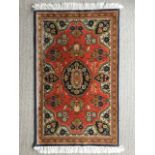 A Ghoum Turkish hand woven rug, 95 x 59 cm (6)