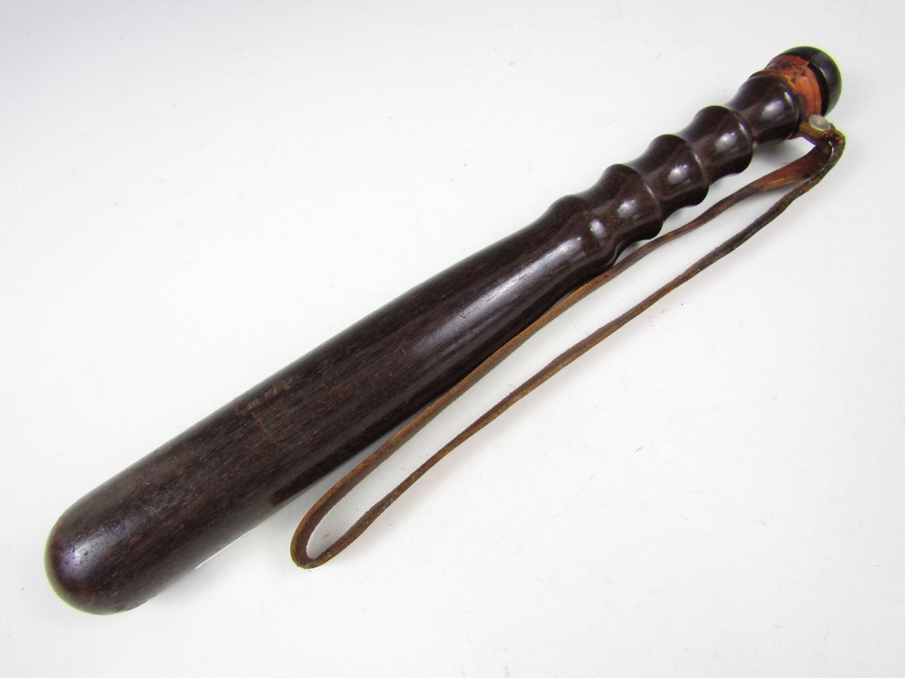 A wooden truncheon