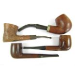 Four briar pipes