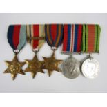 A mounted group of Second World War campaign medals including Africa Star with North Africa 1942-