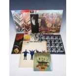 A collection of vintage The Beatles Parlophone records / LP's, including Help! PMC 1255, A Hard