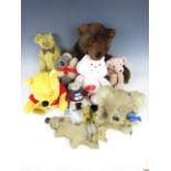 A Russ Timber teddy bear together with a quantity of other Teddies including Russ Bradford, Russ