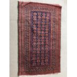 An oriental hand woven rug in puce and blue, 157 x 94 cm (10)