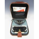 A cased vintage Imperial Good Companion typewriter